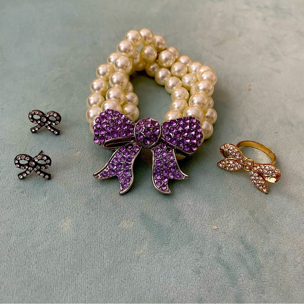 Jewelry lot includes bracelet, ring (size 7), earrings